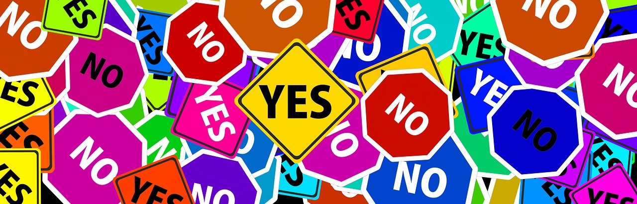 Illustrated colorful street signs that either say yes or no.